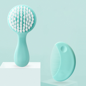 Brosse à tête ronde et brosse à cheveux pour bébé avec des poils doux et une poignée PP