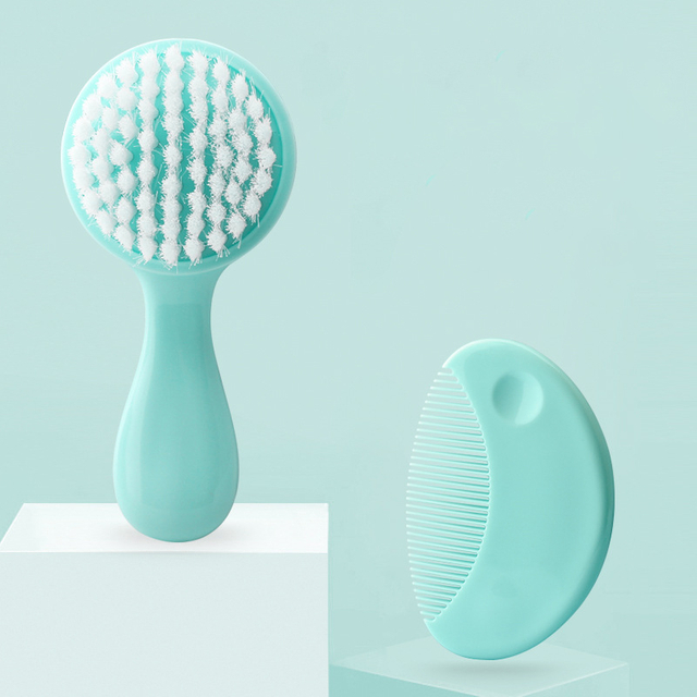 Brosse à tête ronde et brosse à cheveux pour bébé avec des poils doux et une poignée PP